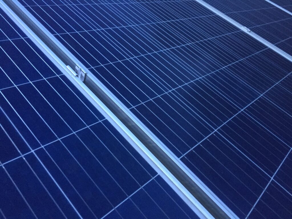 architectural photography of blue and white solar panel