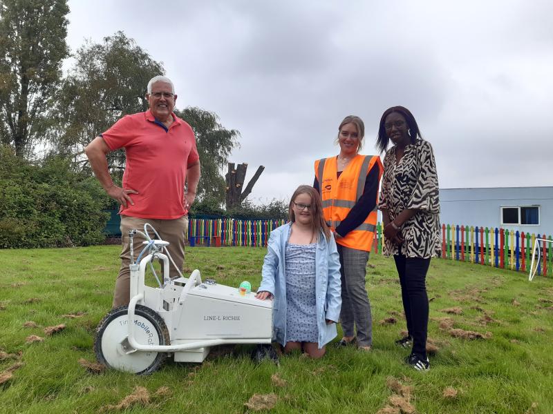 Cllr Ken Hawkins, Ella, Kerry Taylor from Veolia/idverde and Jessica Francis,  Deputy Headteacher at Reynalds Cross School, welcome Line-l Richie, courtesy of Solihull Council 