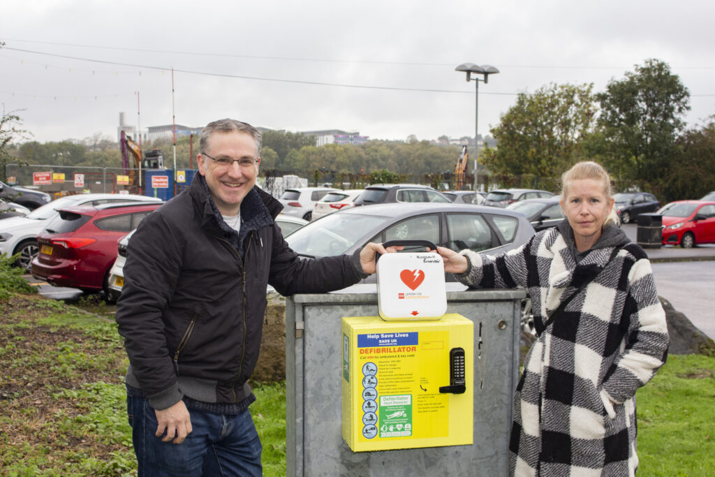 Cllr Jason Zadrozny, Leader of Ashfield District Council, with the new defibrillator installed at Kings Mill Reservoir