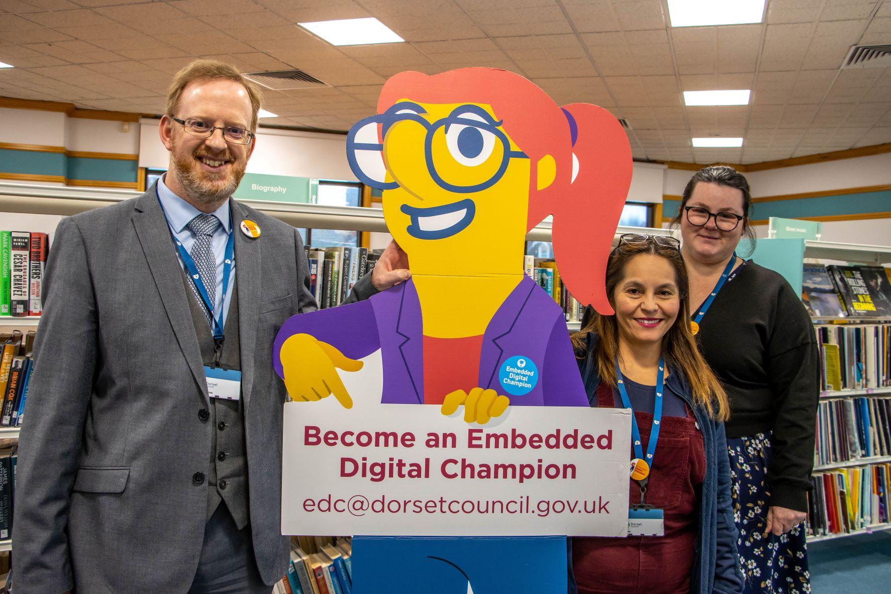 Three members of staff at Weymouth Library trained as embedded digital champions (EDCs)